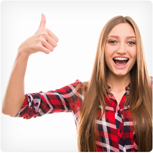 Excited Young Girl Showing Gesture Thumbs Up
